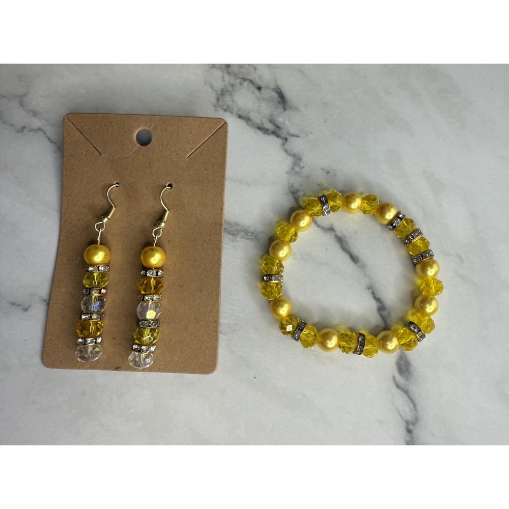 handmade beaded dangle earrings and bracelet yellow and clear tones